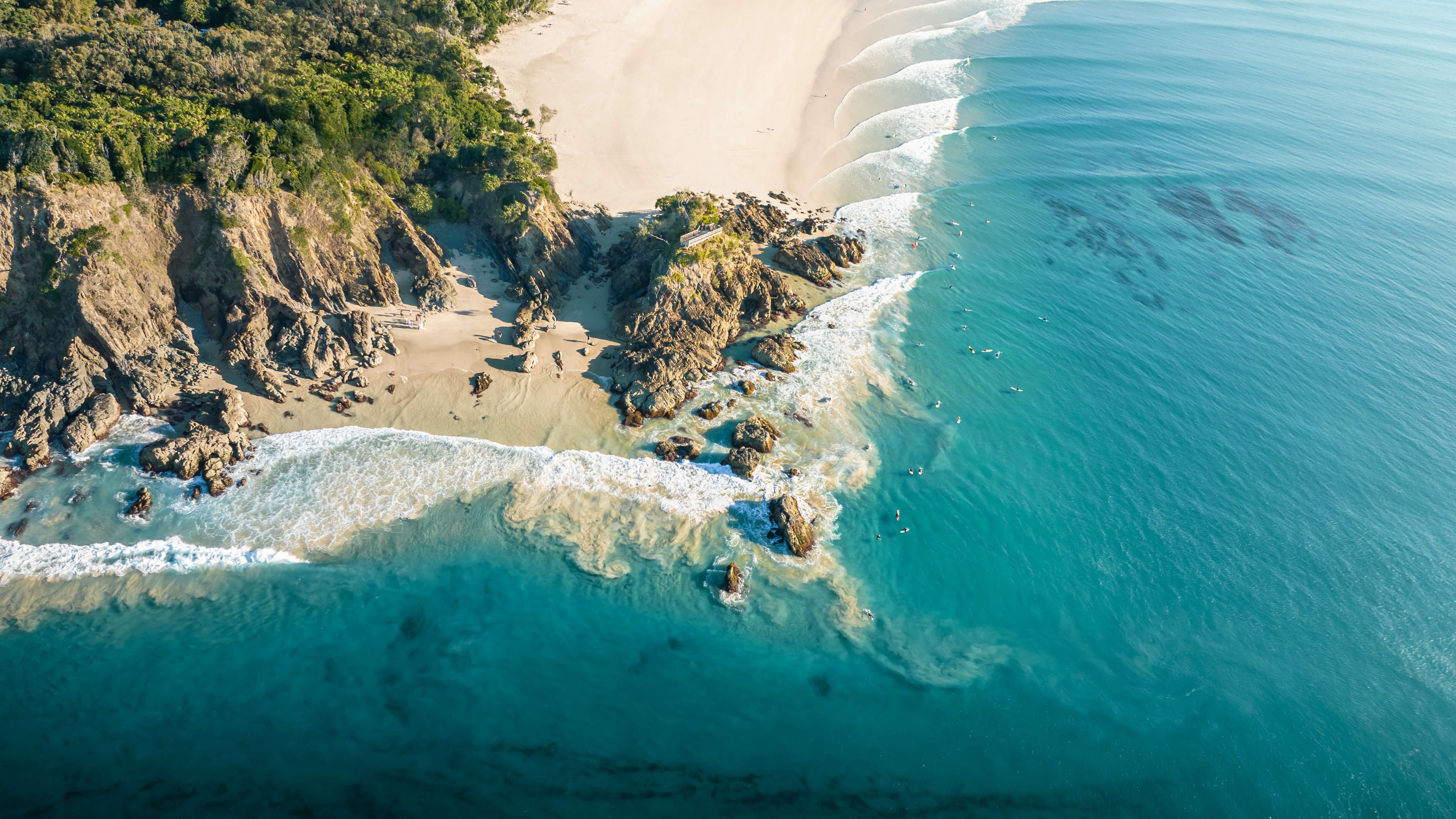 An australian photo of the Pass in Byron Bay. A wall art print of the coast and surfers from above.