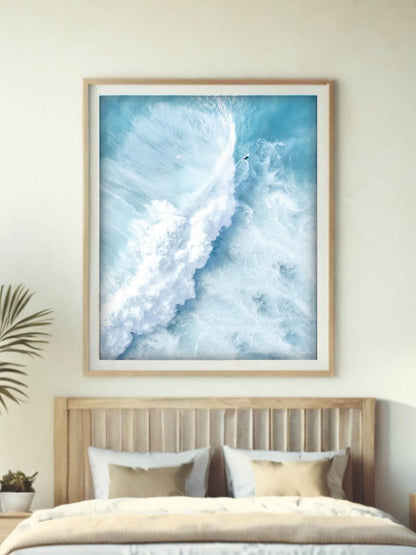 Framed aerial photograph of a surfer carving through a powerful wave at Bronte Beach, creating an abstract ocean scene.