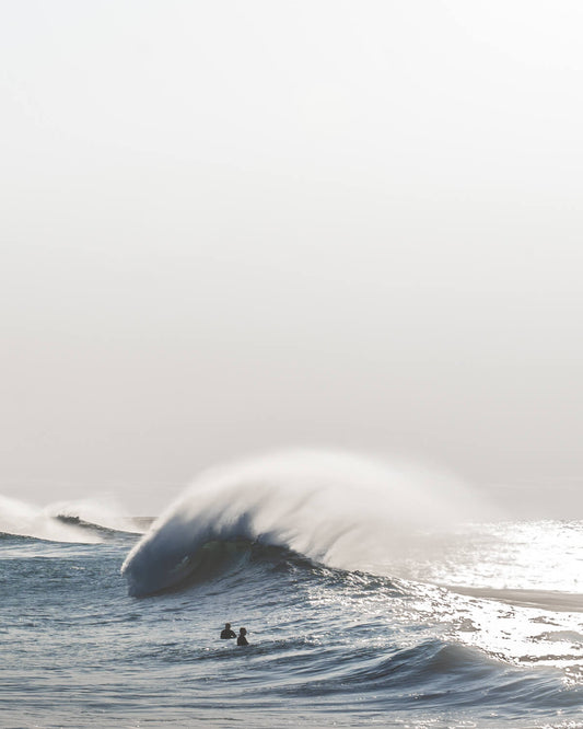 Early morning winter swell on Sydney’s coast with surfers waiting for waves, captured between Bronte and Tamarama Beach.